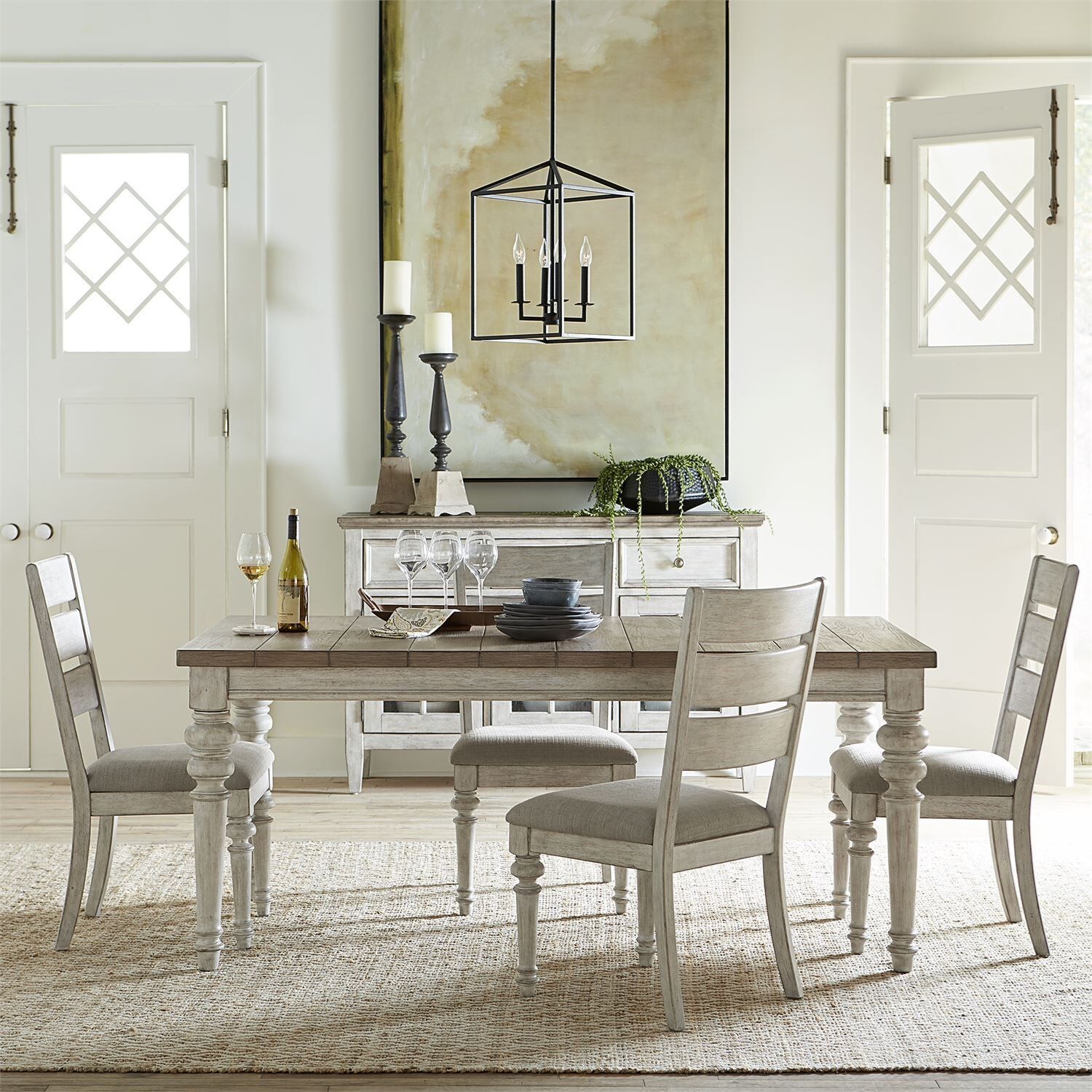 Heartland antique white round pedestal chair side sales table